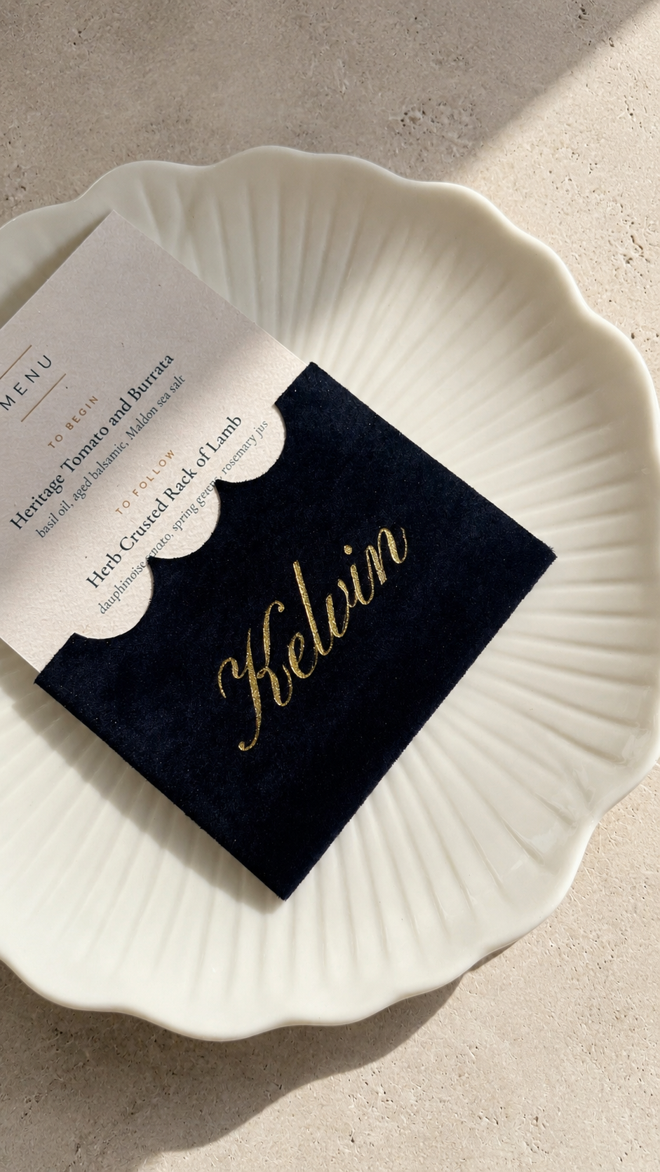 Velvet place card and menu photographed flat, menu standing proud of the pocket
