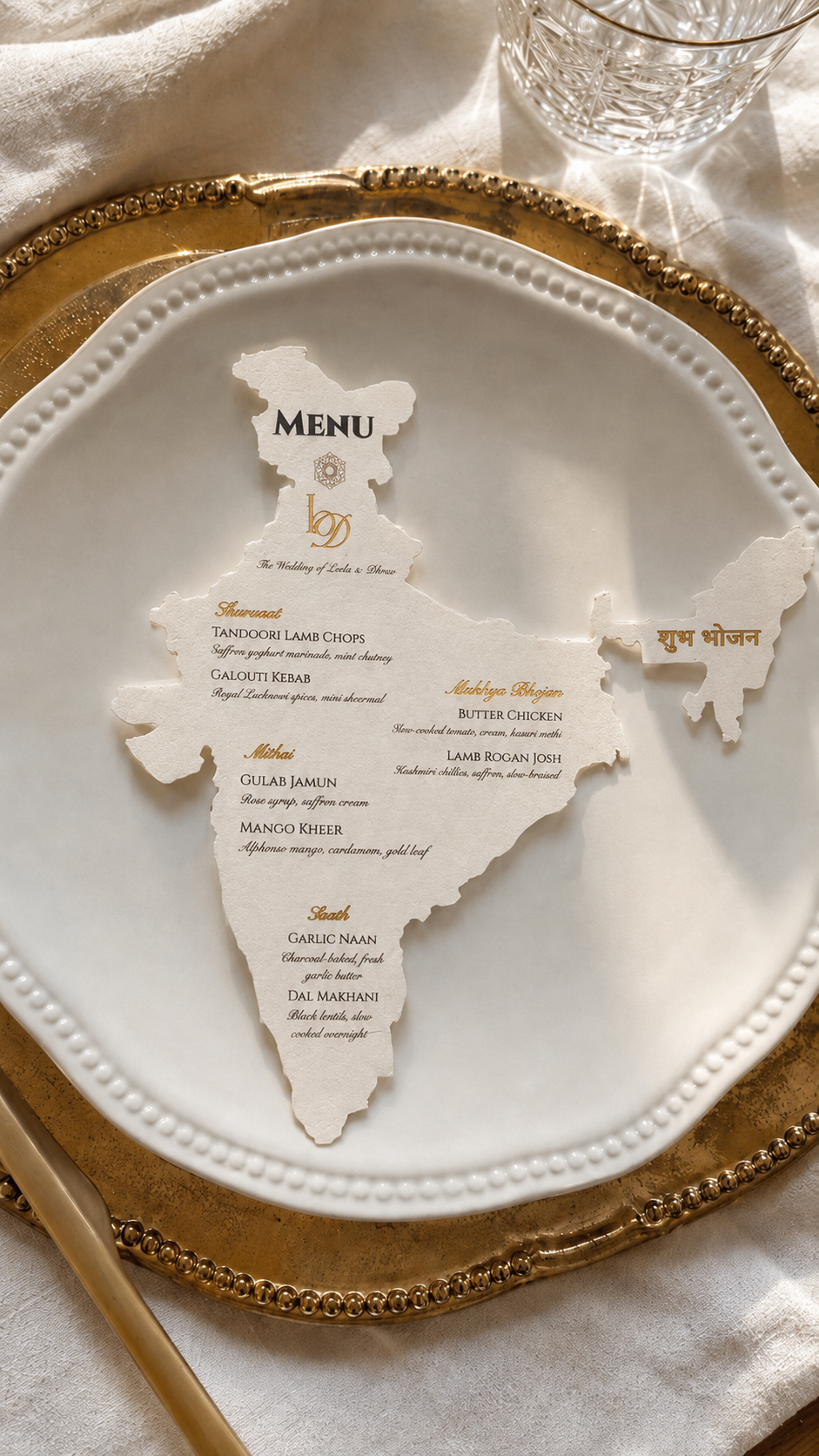 Close up of India silhouette wedding menu showing personalised courses and event details