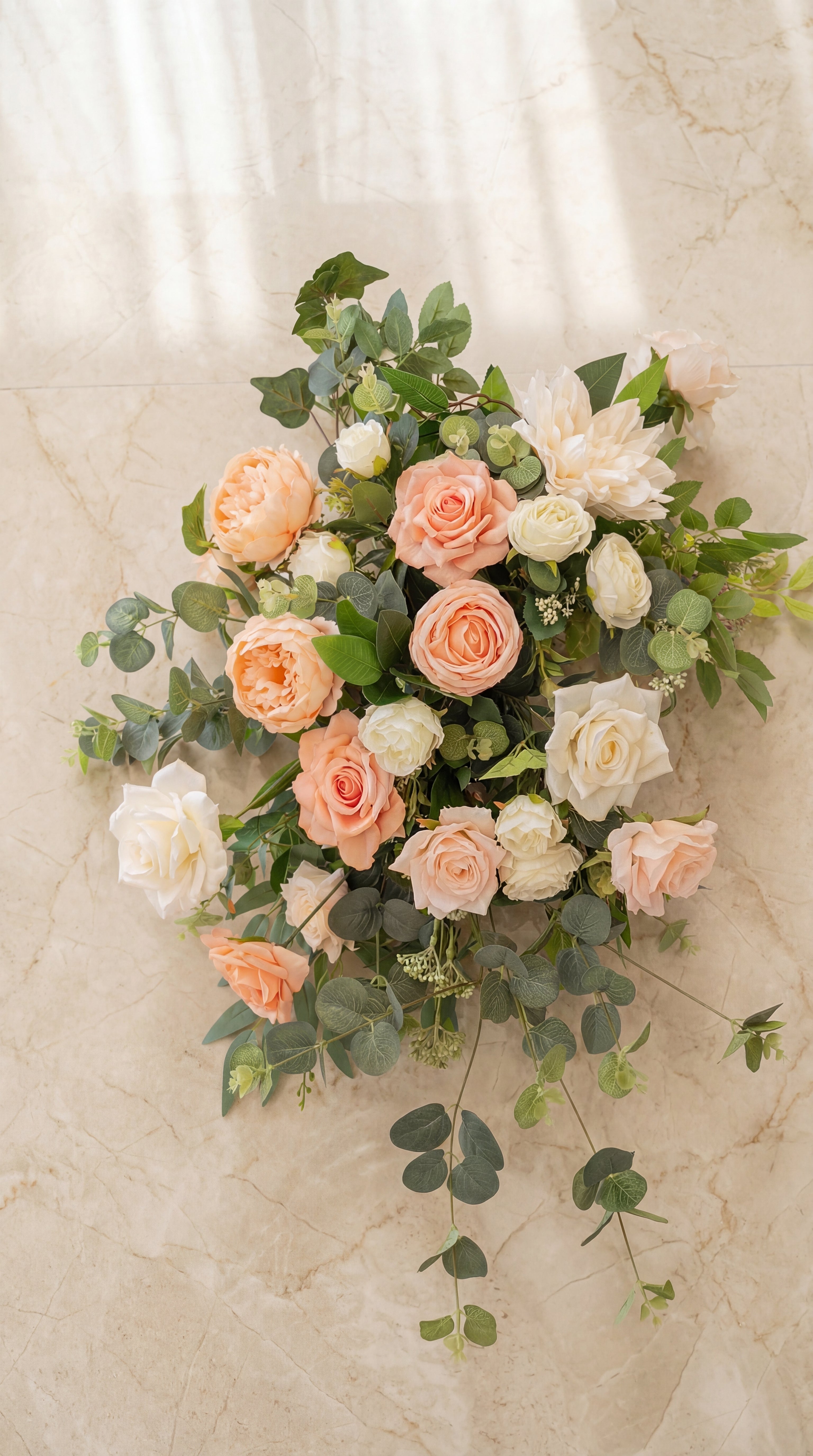 luxury peach faux floral arrangement centrepiece for wedding or event table